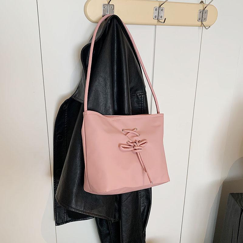 Ballet style women's bag 2025 new trend fashionable sweet handbag niche pearlescent texture shoulder bucket bag