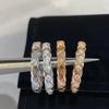 White Copper Plated Gold Narrow Band Ring with Argyle Design and CNC Carved Details