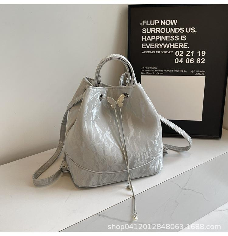 

Summer small fresh backpack bag women s 2025 new Korean version bucket bag multi-functional versatile shoulder messenger bag