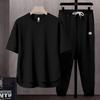 Set da uomo a due pezzi tinta unita tendenza giapponese: T-shirt a maniche corte e pantaloni lunghi (Estate 2025)
