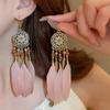 Bohemian ethnic style fringed earrings long niche woven feather earrings new travel wear earrings women