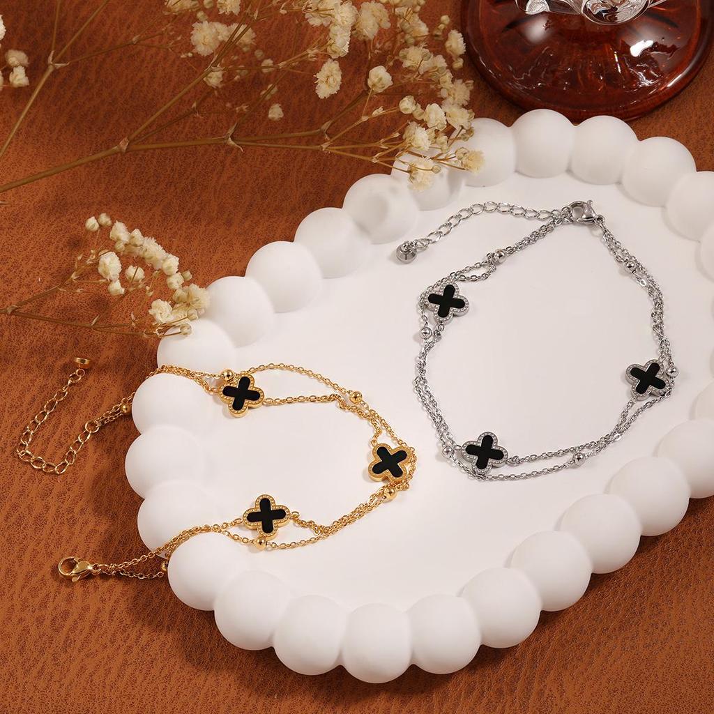 Cheville Coréenne de Luxe avec Perle d'Espacement Trèfle à Quatre Feuilles - Double Couche Acier Titane Haut de Gamme Bijou de Pied pour Femme