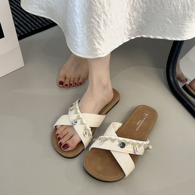 Seaside vacation wind one-word casual with skirt shoes 2025 new flat-bottomed cross with cool slippers women's summer wear