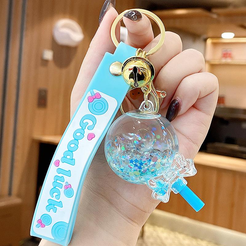 Klíčenka s ozdobou ve tvaru lízátka se sněhovými vločkami a tekutým pískem pro ženy a dívky