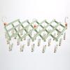 Multi-Functional Retractable Windproof Clothes Drying Rack with Seamless 3D Design and Storage Clips