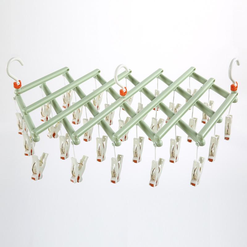 Multi-Functional Retractable Windproof Clothes Drying Rack with Seamless 3D Design and Storage Clips