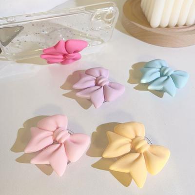 Triangular Phone Stand With Silicone Pad Adjustable Height 8-15cm For Secure Viewing Stylish Bows Shape In Pastels Color