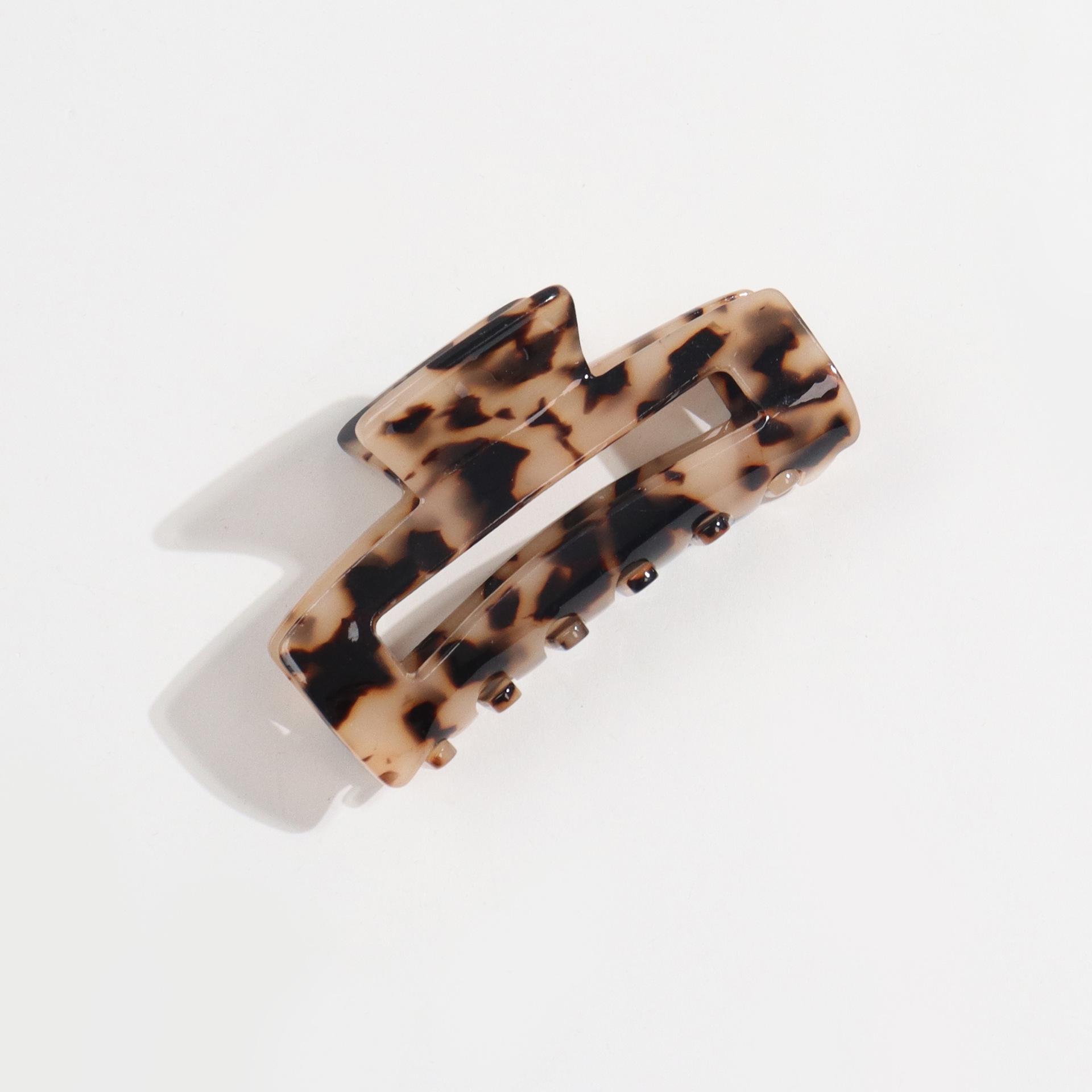 

Individually Wrapped Geometric Heart Brown Claw Clip for Women