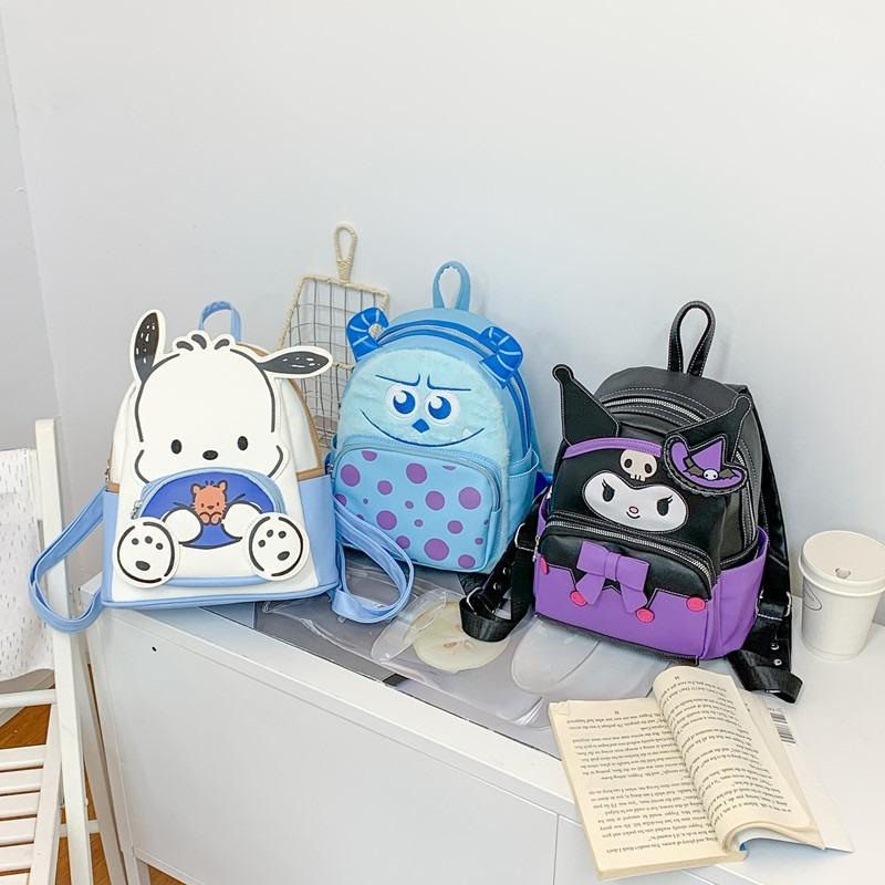 High value blue little monster academy style backpack girls storage casual cute backpack cartoon schoolbag