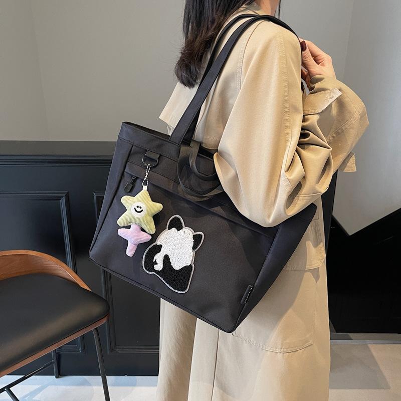 Spring canvas large-capacity messenger bag for women 2025 new trendy cartoon panda print shoulder tote handbag for women