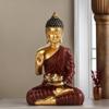 Meditating Sitting Buddha Statue Showpiece Idol Home Decor Living Room Gifts Decorative Showpiece - 27 Cm  (Resin, Red, Gold)