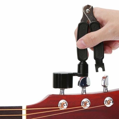 Multifunctional 3-in-1 String Winder with Peg Winder, Nippers, and Bridge Pin Puller for Guitar, Acoustic Bass, and Maintenance. Small, lightweight, a