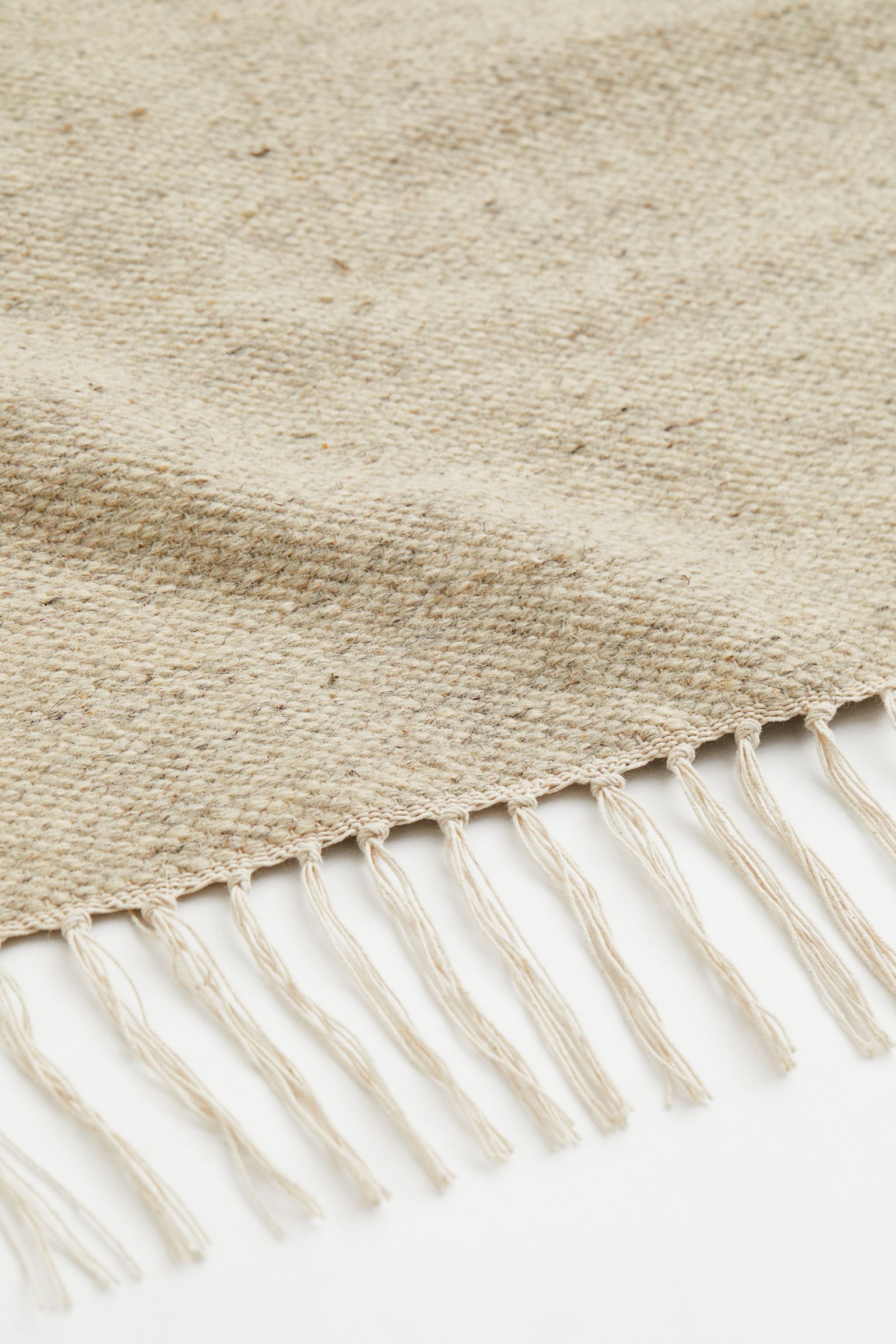 

Шерстяной ковер плоского переплетения