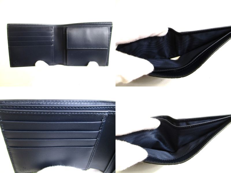 Autentyczny portfel GUCCI GG Metal Guccissima Granatowy Skórzany Podwójnie Składany #9947 Otwarte pudełko