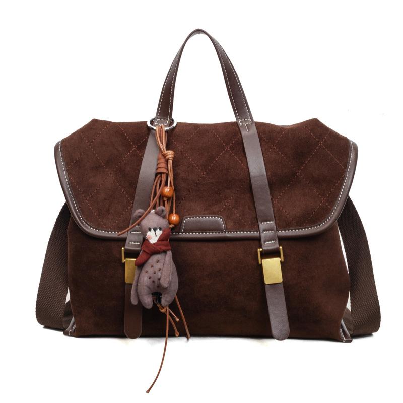 

Korean version of college style backpack women s 2025 winter new fashion retro schoolbag versatile casual backpack no pendant темно-коричневого кольору