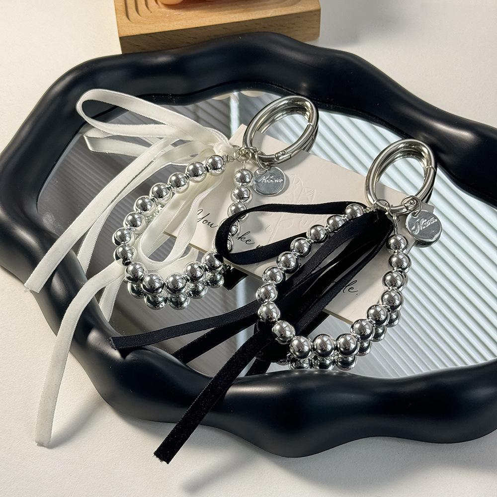 Korean-Style Bow Car Keychain with High-End Silver Bead Ribbon Pendant