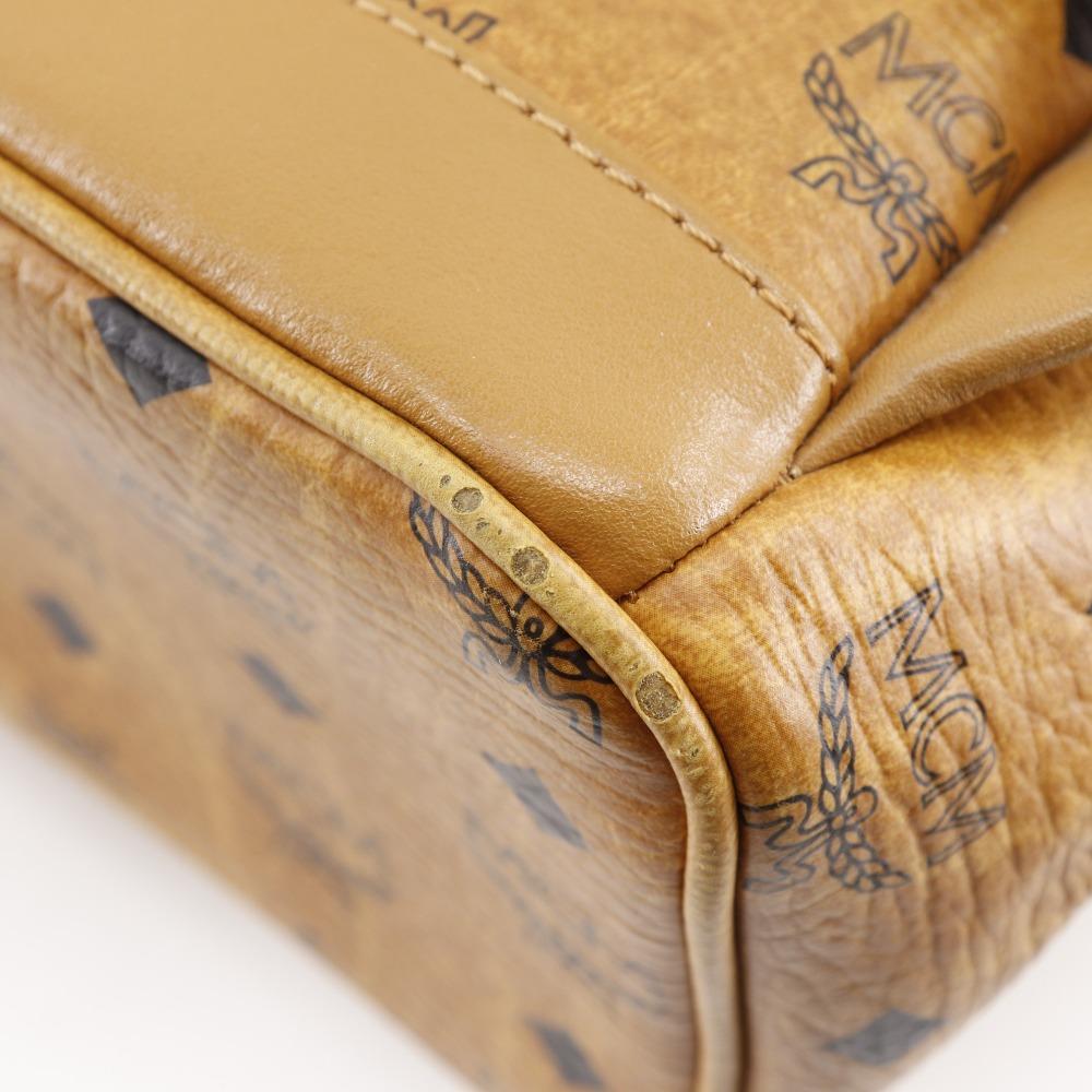 MCM Logogram Rucksack Tagesrucksack MMK2AVE20 Kleine Nieten Braun PVC Damen Gebraucht