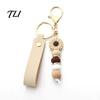 Anti Oxidation Metal Keychain Silicone Flower with Faux Leather Wristlet, Car Key Holder Ring Pendant, Handbag Backpack Charm Wood Beads Aesthetic
