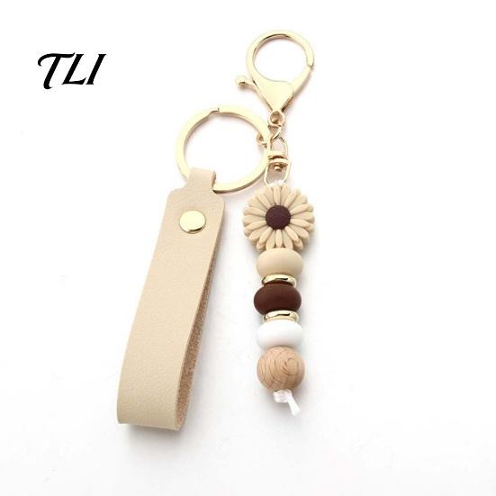Anti Oxidation Metal Keychain Silicone Flower with Faux Leather Wristlet, Car Key Holder Ring Pendant, Handbag Backpack Charm Wood Beads Aesthetic