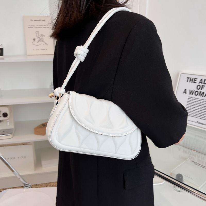 Преміальна та нішева жіноча сумка влітку зі стильною текстурою та сумкою через одне плече. Універсальна сумка під пахви для жінок