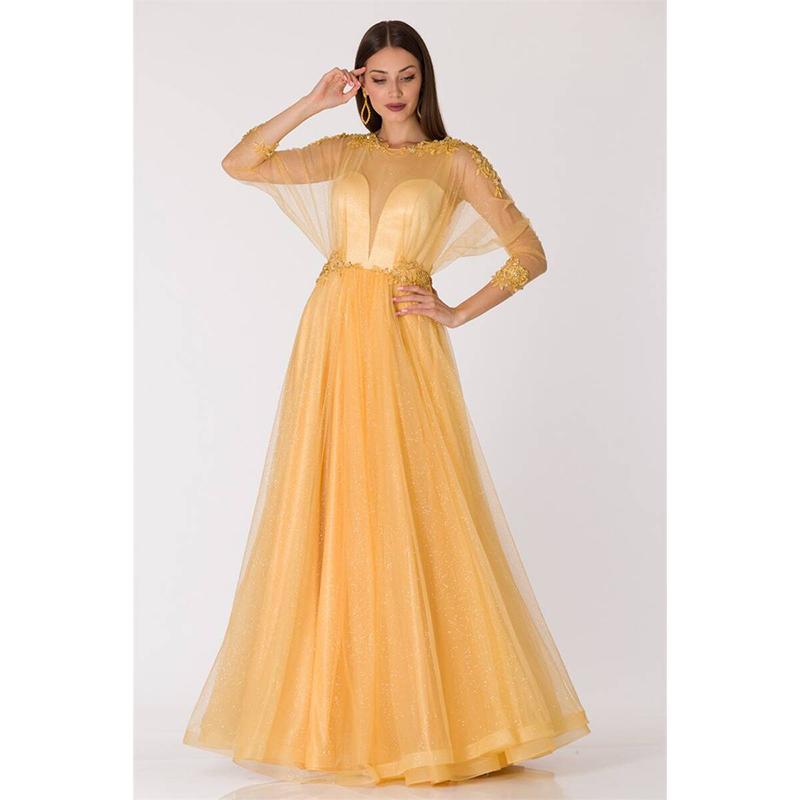

Сверкающее широкое прозрачное вечернее платье желтого цвета