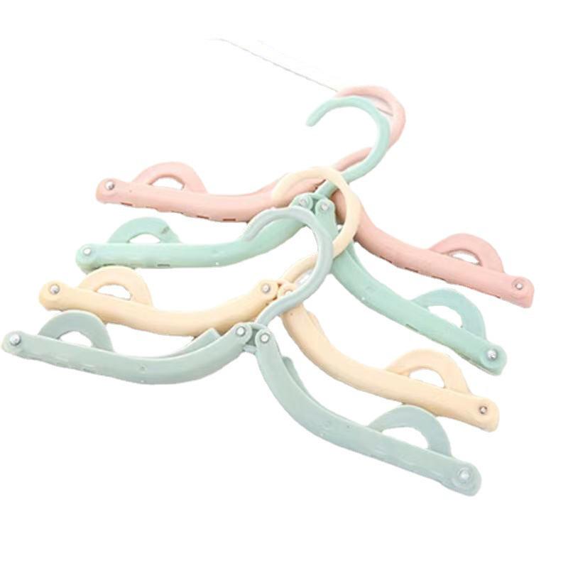 Multifunctional Non-Slip Folding Clothes Hanger & Drying Rack for Travel, Dormitory, or Hotel.