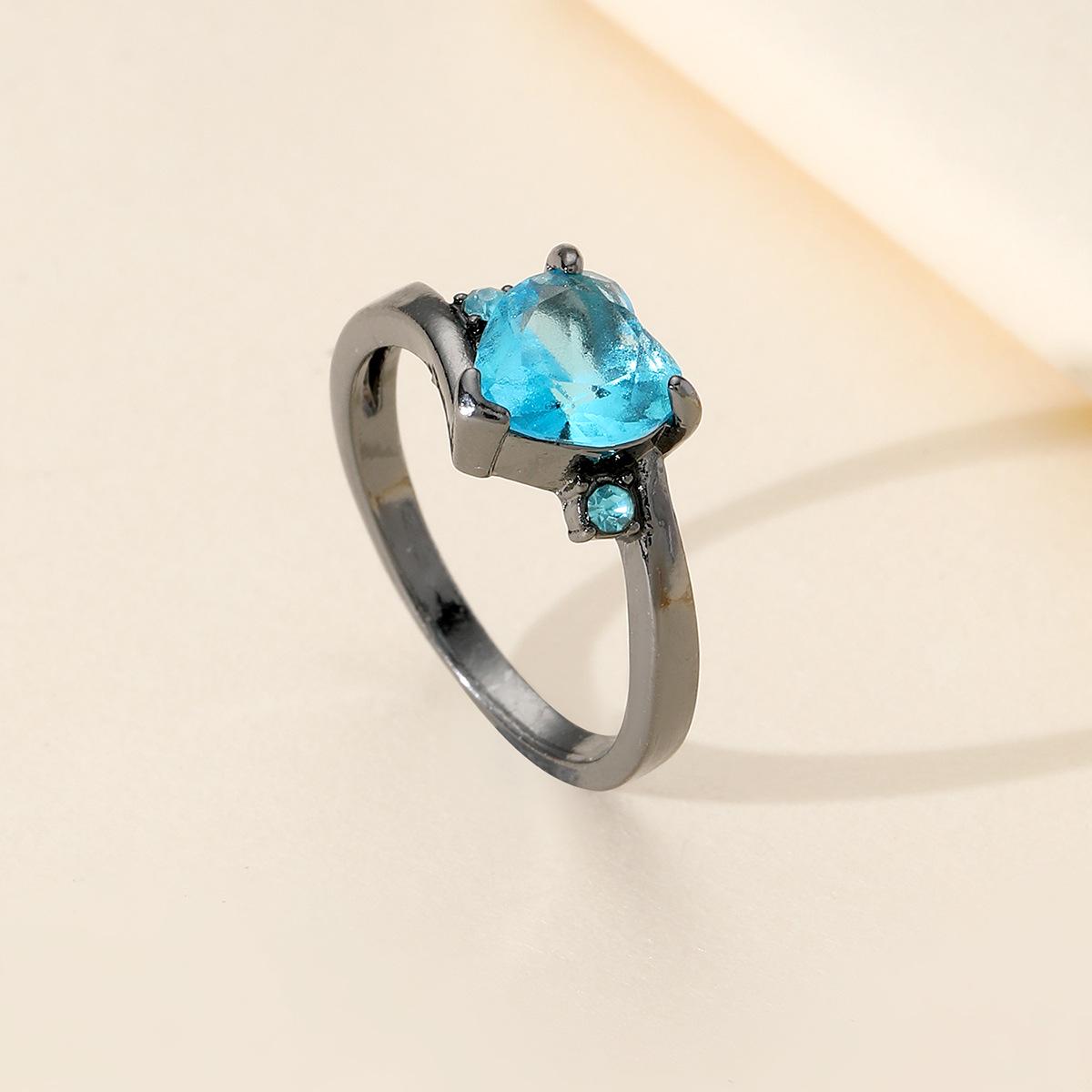 

Elegant Black Gold Heart-Shaped Blue Zircon Ring for Women Size 7