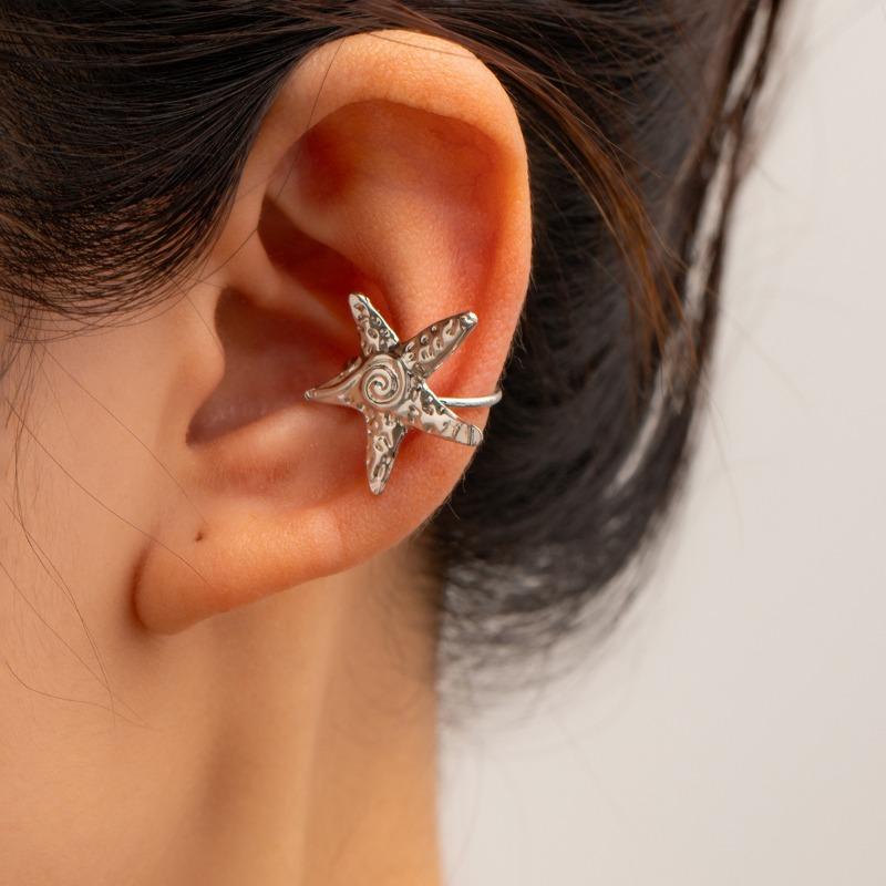 Gold earrings, new alloy jewelry, niche light luxury starfish earrings, women's earbone clips.
