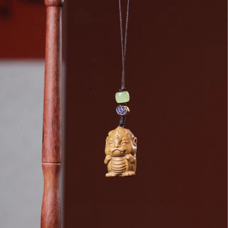 Twelve Zodiac Animal Charms Green Sandalwood Set: Rat, Ox, Tiger, Rabbit, Dragon, Snake, Horse, Sheep, Monkey, Rooster, Dog, Pig.
