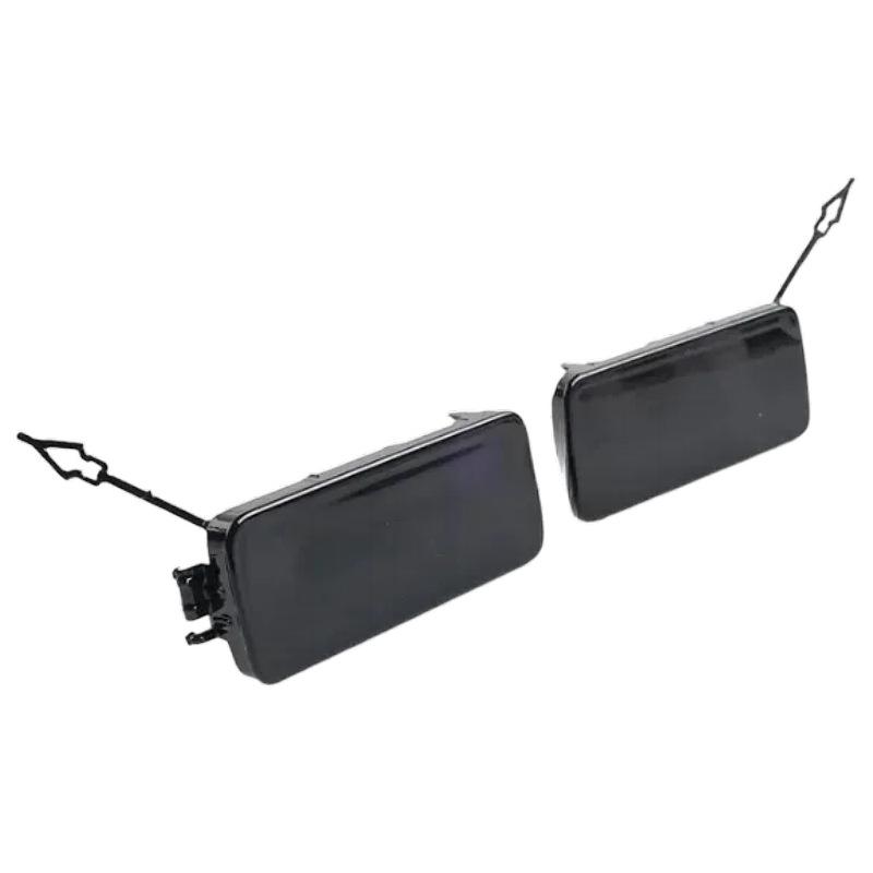 LR129768/LR129767: Decorative Rear Bumper Tow Hook Covers for 2020 Land Rover Defender.