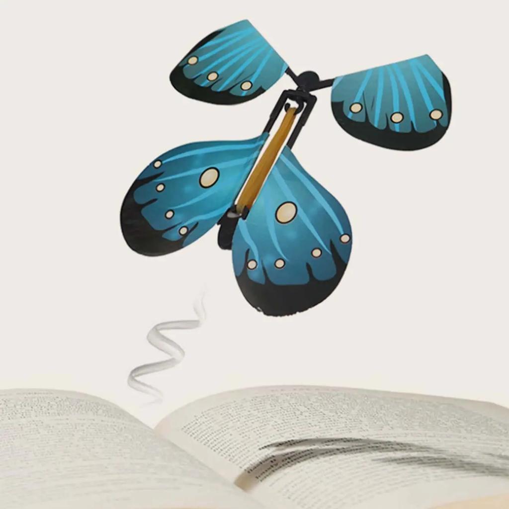 1PC  Magic Wind Up Flying Butterfly In The Book Rubber Band Powered Magic Fairy Flying Toy Great Surpris Gift Party Favor