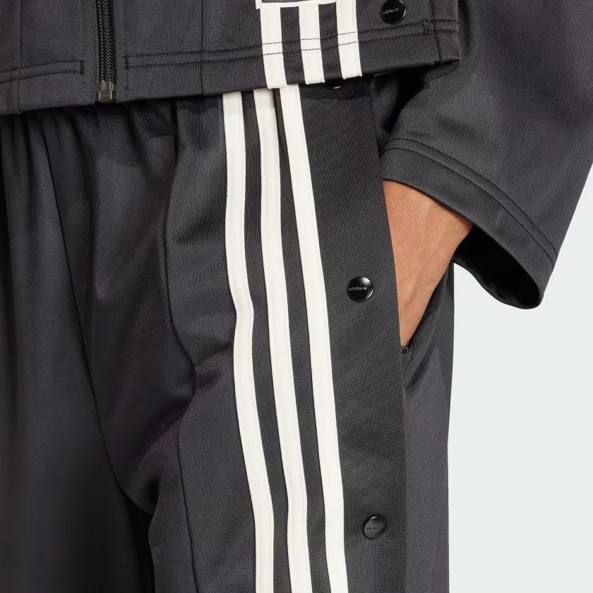 Adidas Pantalón de Chándal de Punto Adibreak Originals con Rayas Laterales y Cintura Elástica para Mujer Negro IS5252