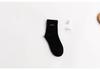 Chaussettes Mi-Mollet pour Femmes - Style Coréen et Japonais, Broderie Mignonne, Résistantes aux Odeurs, Couleur Unie, Parfaites pour le Printemps, l'Automne et l'Hiver.
