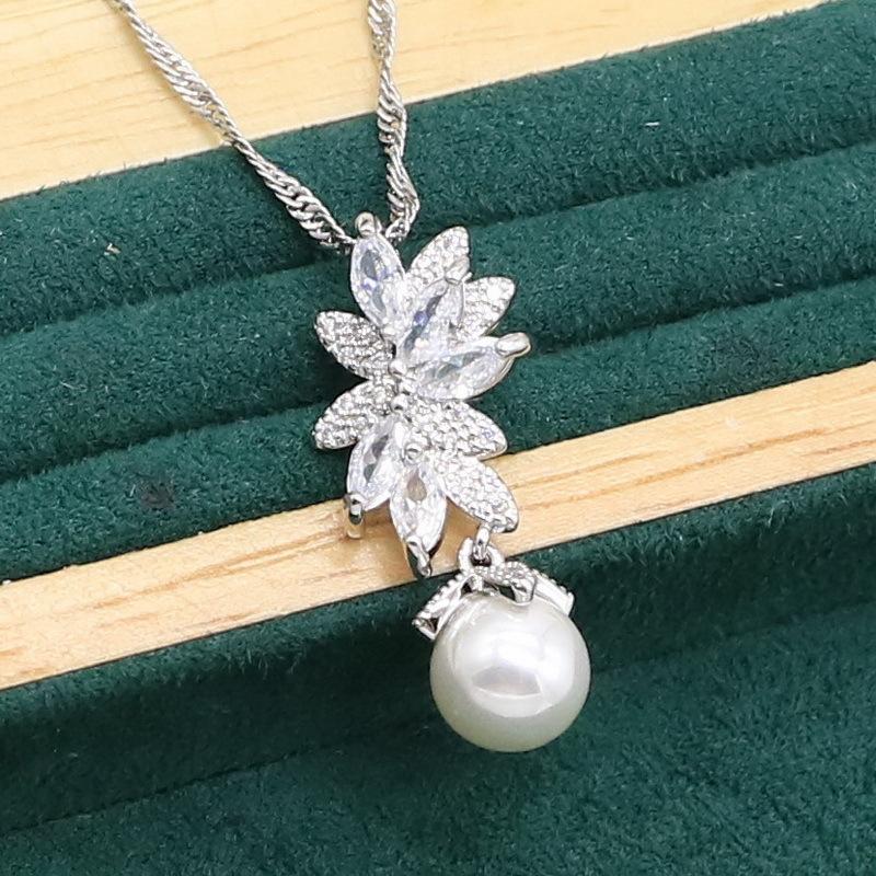 Europe and The United States Hot Jewelry Allergy Pearl Zircon Bracelet Necklace Earrings Ring Jewelry Set