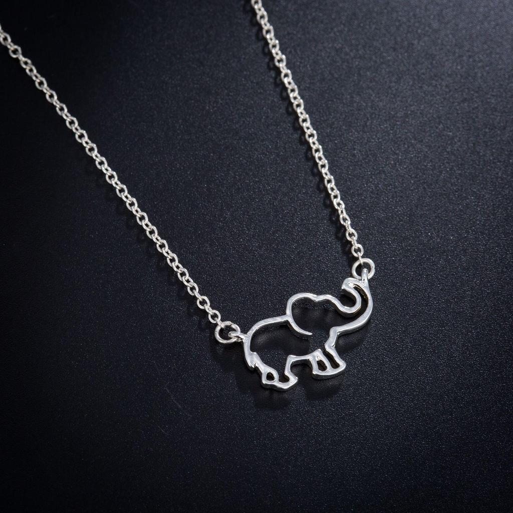 Elegant Elephant Pendant Necklace: Cute Hollow Design for Women