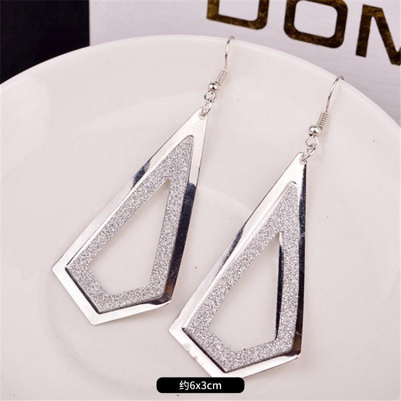 Fashion exaggerated niche temperament fringed earrings retro personality versatile sequined earrings women's long ear jewelry