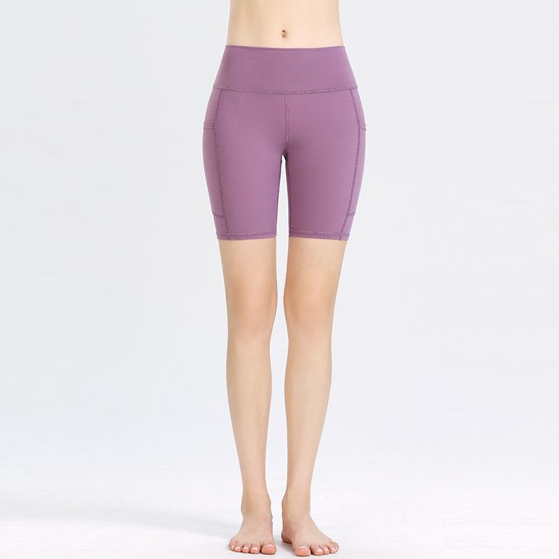 New Yoga Shorts Female High-waisted Hip-lifting Sports Shorts Elastic Tight Pockets Running Fitness Four Pants