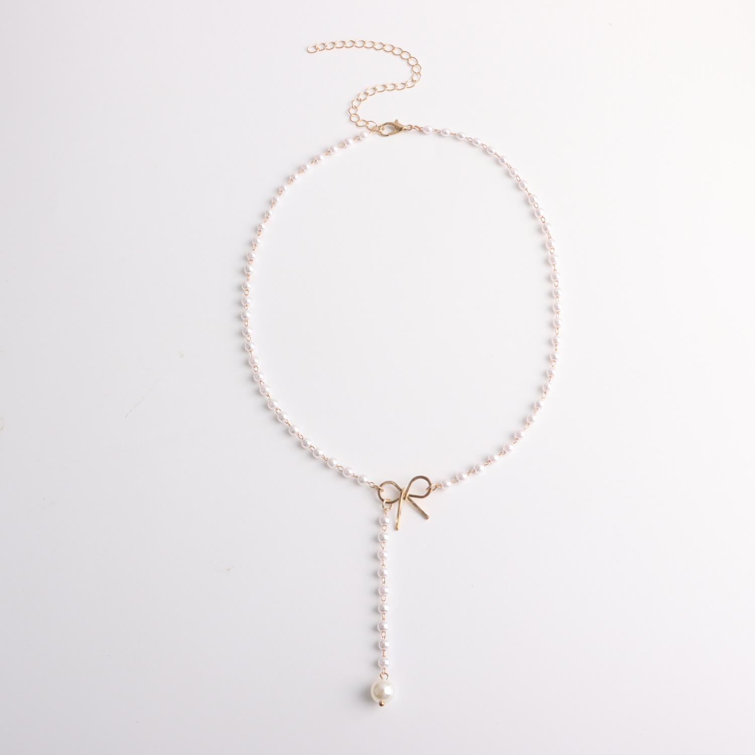 European and American jewelry, alloy bow pearl fringed pendant necklace, women s simple temperament popular necklace золотой