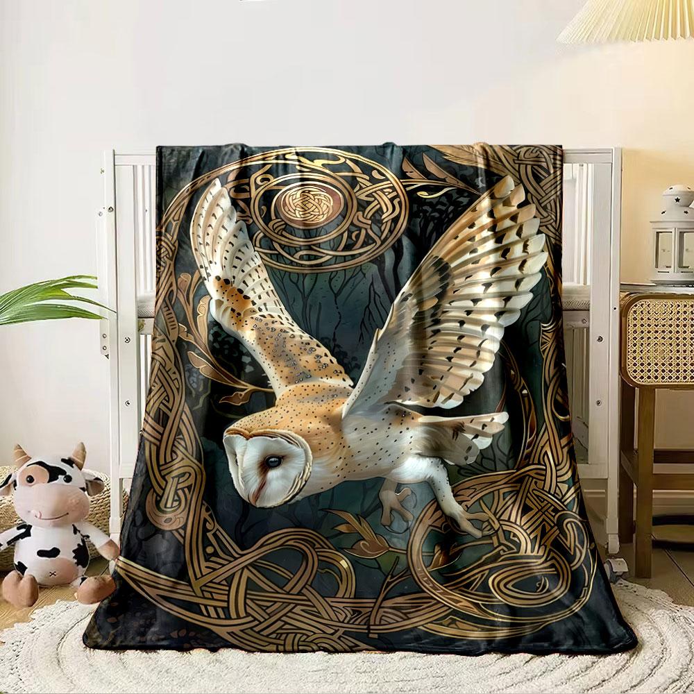 An owl in flight surrounded by intricate golden Celtic knotwork. for all seasons blanket lunch break throw gift 80cm x 120cm