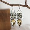 A pair of Bohemian vintage owl earrings, set with synthetic gemstones, suitable for everyday wear.