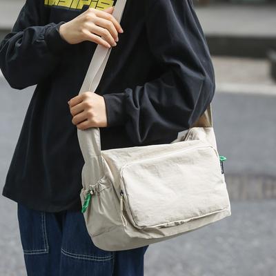 Bolsa tiracolo masculina marca moderna estudante universitário casal casual bolsa carteiro feminina grande capacidade simples esportiva bolsa tiracolo
