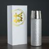 Light luxury hammer pattern titanium covered thermos cup fashionable tea separation ice crystal health tea cup high-end business gift titanium cup