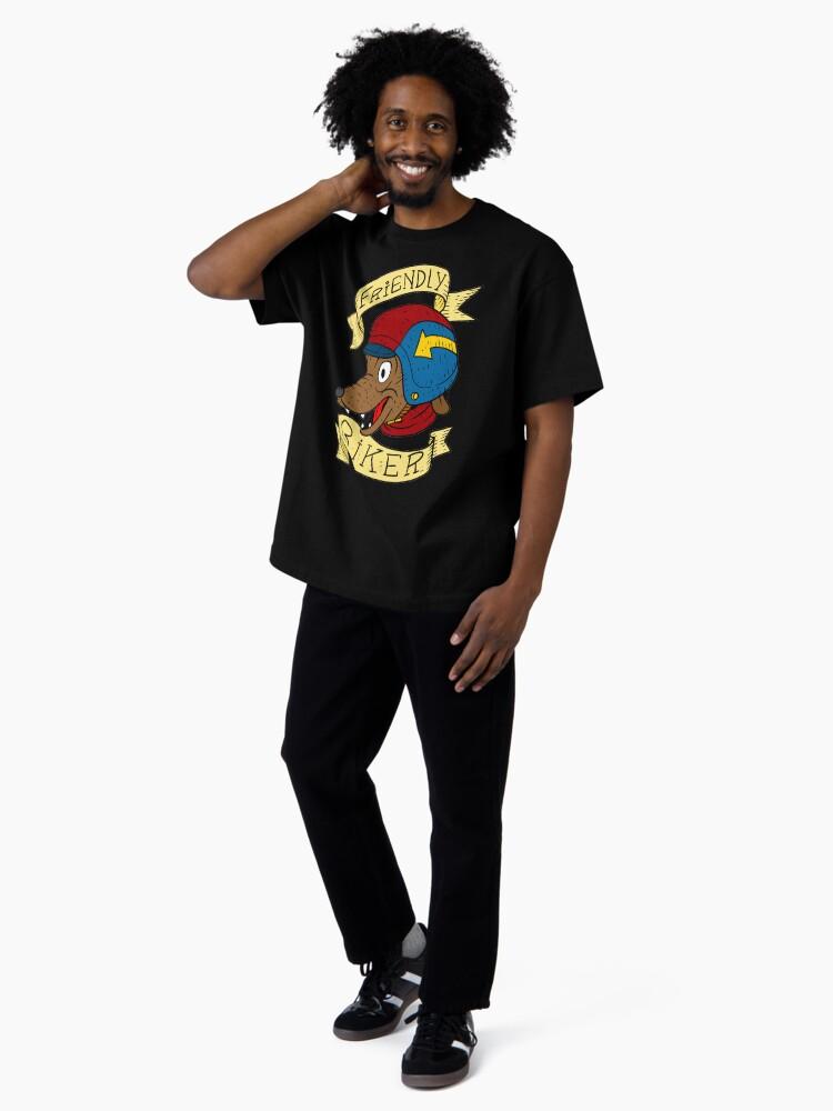 Biker Mice from Mars friendly biker with a helmet. wolf dog. Oversized T-Shirt