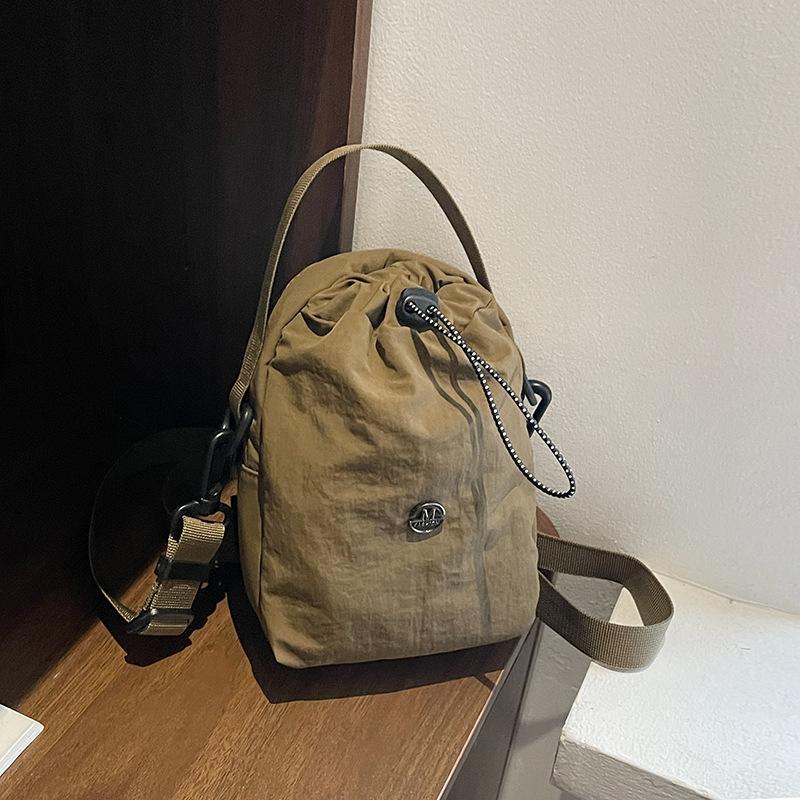 Kettle bag waterproof casual shoulder bag women's tide brand versatile mobile phone bag fitness walking messenger bag water cup cloth bag men