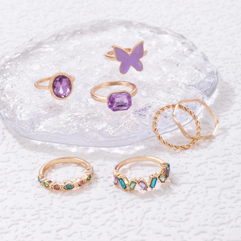 European and American new dripping butterfly imitation gemstone and diamond ring set Geometric twist ring seven-piece set