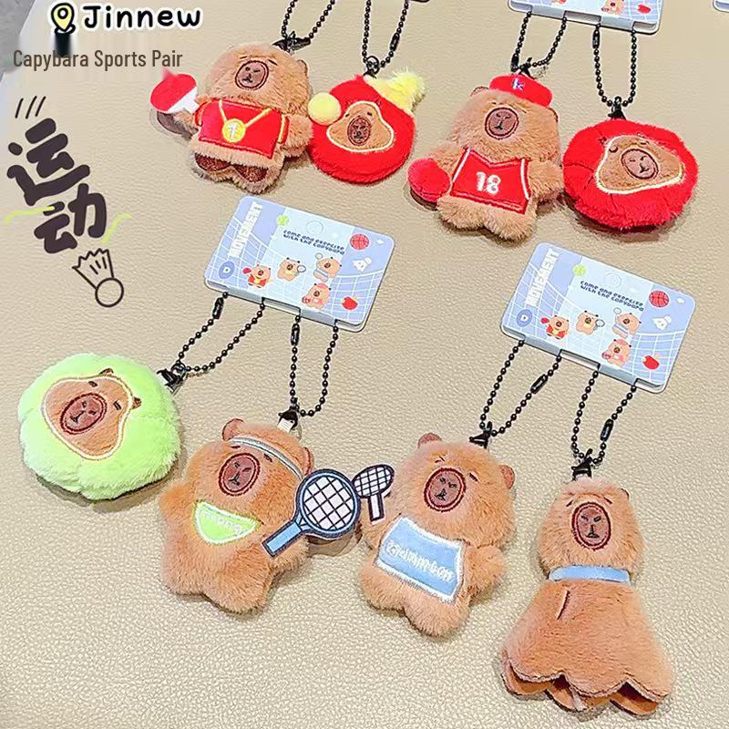 

Capybara Family Sports Meet Plush Keychain – Cute Ornament and Gift 10cm