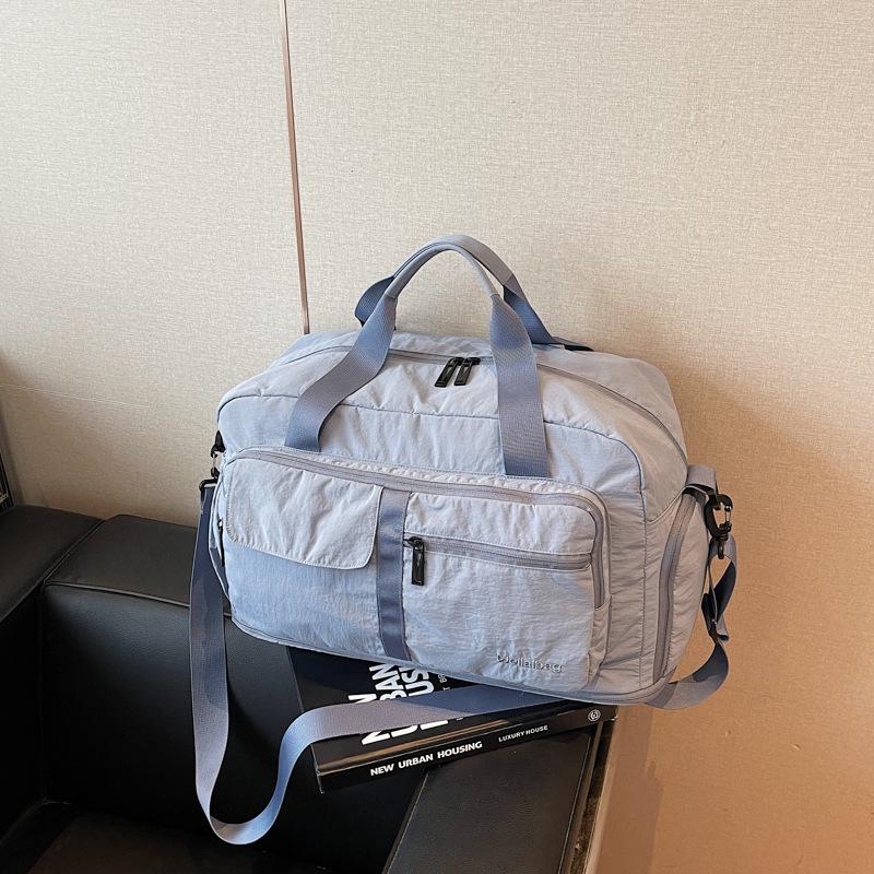 Large capacity portable short-haul travel bag Women's fashion lightweight luggage bag Men's travel storage Sports fitness bag