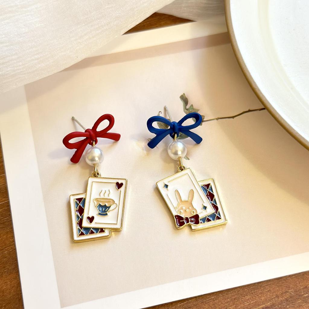 Asymmetrical Poker Rabbit Bowknot Earrings with Silver Needle Stud and No-Pierce Clip.