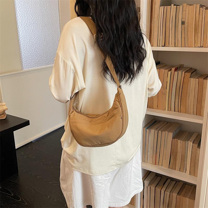 Minimalist Crossbody Bag with Adjustable Strap and Front Zip Pocket Lightweight Everyday Shoulder Bag