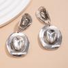 Personality Exaggerated Metal Hat Pendant Earrings Women'S High-End Sense Retro Texture Earrings Earrings